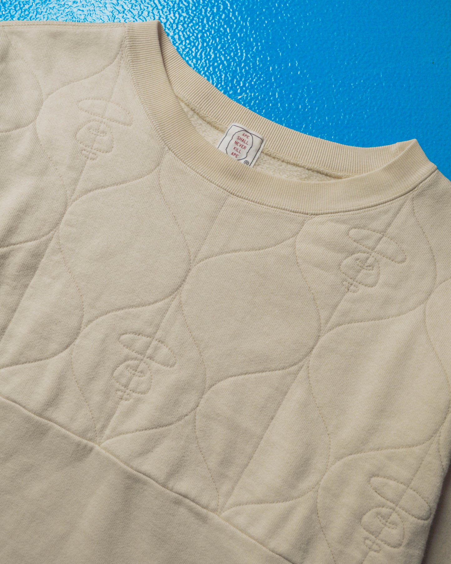 Early 2000s Beige Half Onion Quilted Logo Jumper (M)