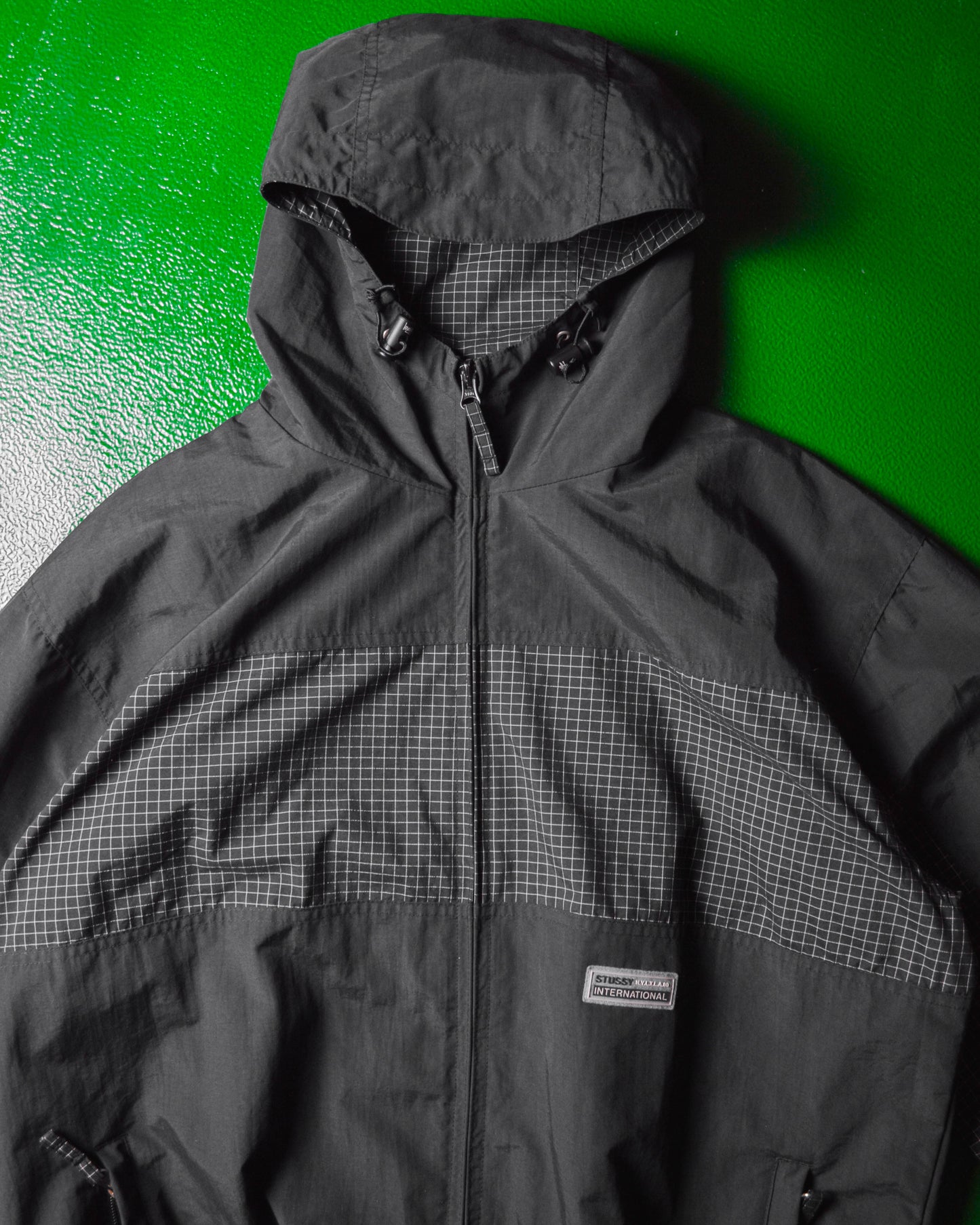 International Grid  Reflective Panelled  Shell Jacket (M)