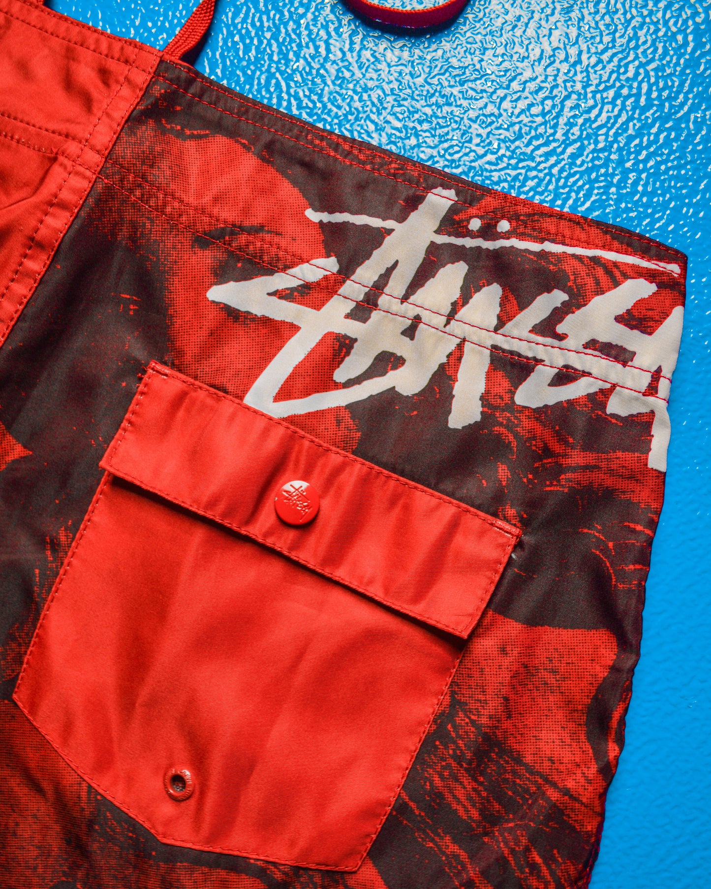 Red Venus Asymmetrical Logo Poly Board Shorts (32)