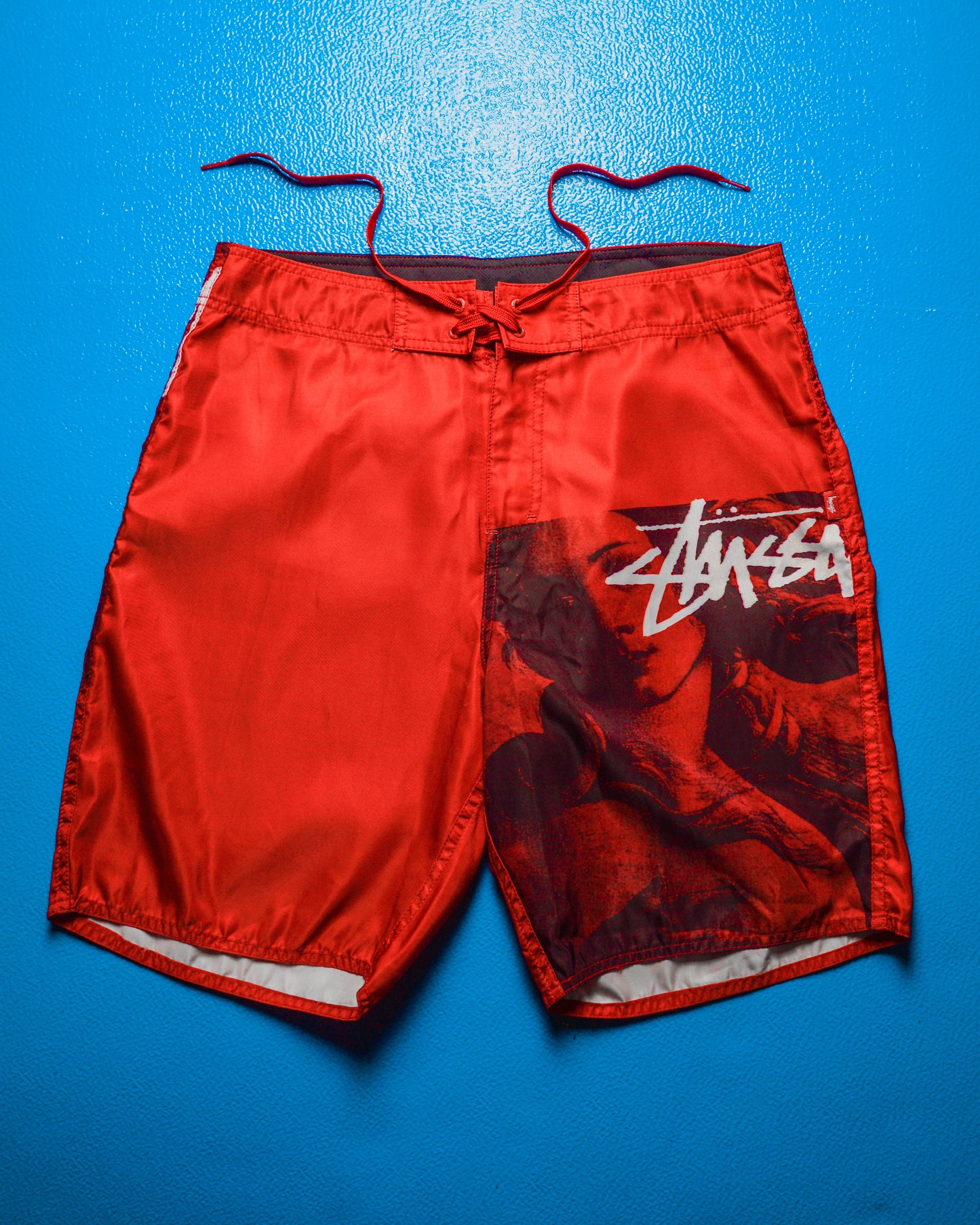 Red Venus Asymmetrical Logo Poly Board Shorts (32)