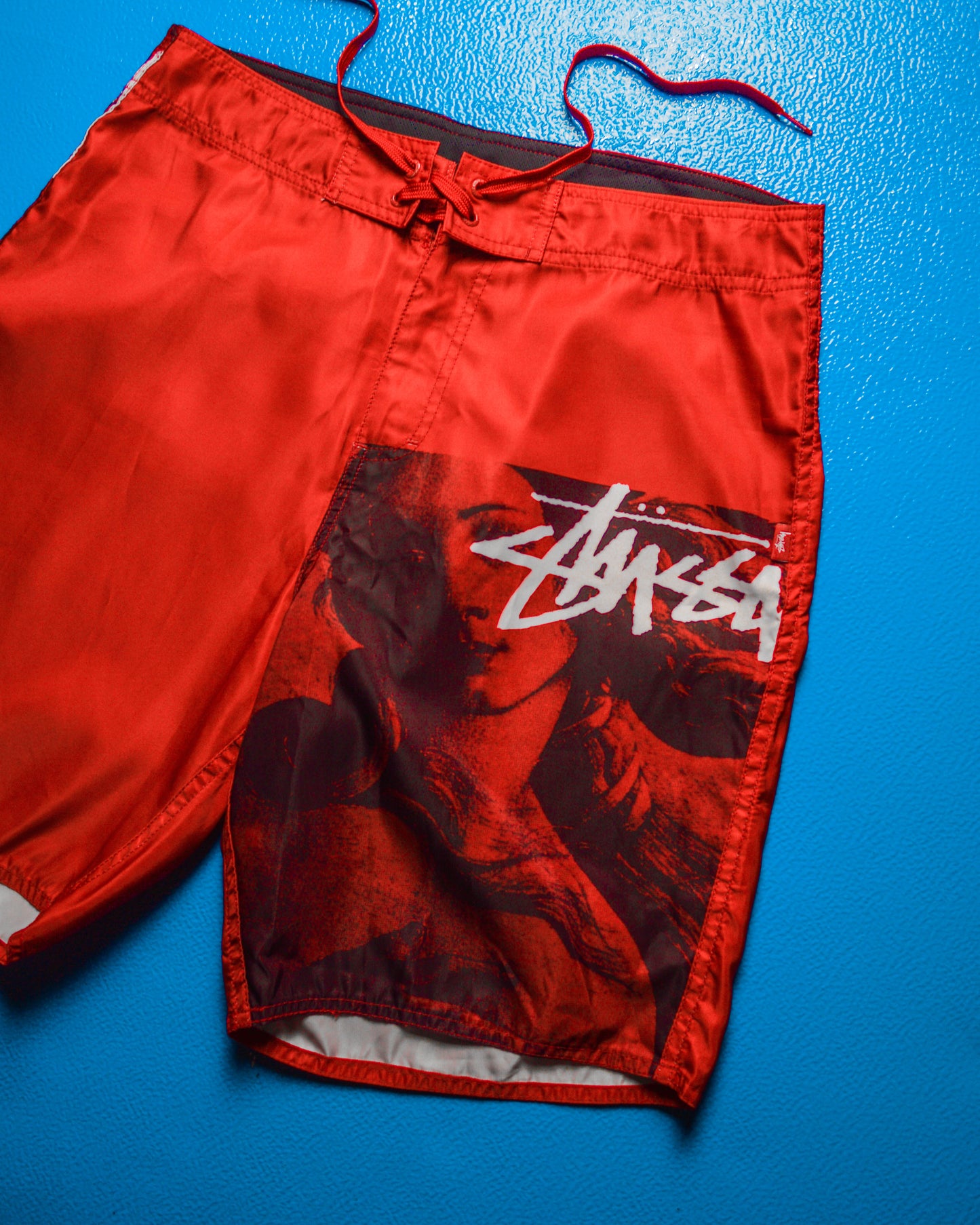 Red Venus Asymmetrical Logo Poly Board Shorts (32)