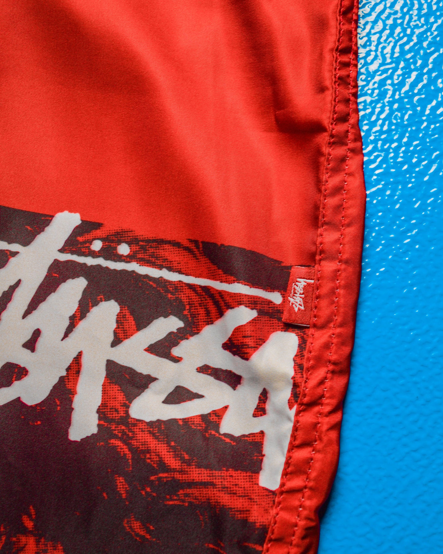 Red Venus Asymmetrical Logo Poly Board Shorts (32)